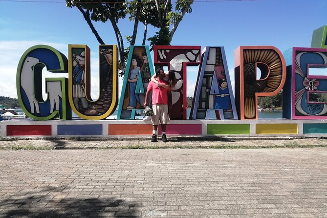 Amazing Private Guatape Tour + Boat Ride + Helicopter & Rock - Color plaza time in Guatapé: a photo stop with purpose