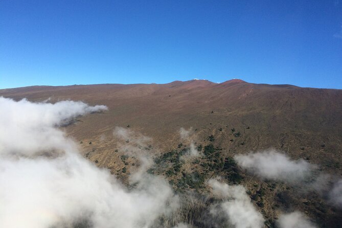 Complete Island 60-Minute Helicopter Tour - East Maui: sugar fields, Hana coast, and waterfall country from above