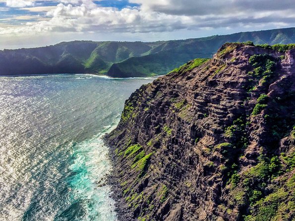 Doors Off West Maui and Molokai 45 minute Helicopter Tour - Stop 1: Molokai north shore sea cliffs, rainforest, and waterfalls