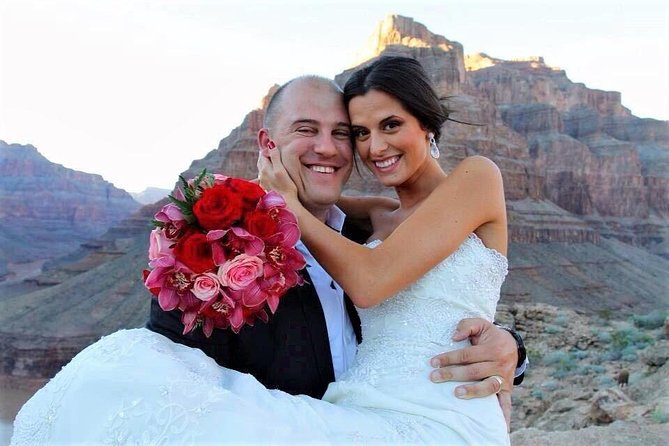 Grand Canyon Helicopter Wedding - Grand Canyon West ceremony: minister options and vow moments