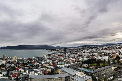 Helicopter Tour: Reykjavik City with landing at Mount Esja - Reykjavik from Above: Rooftops, Harbor Views, and Bright Blue Water Areas