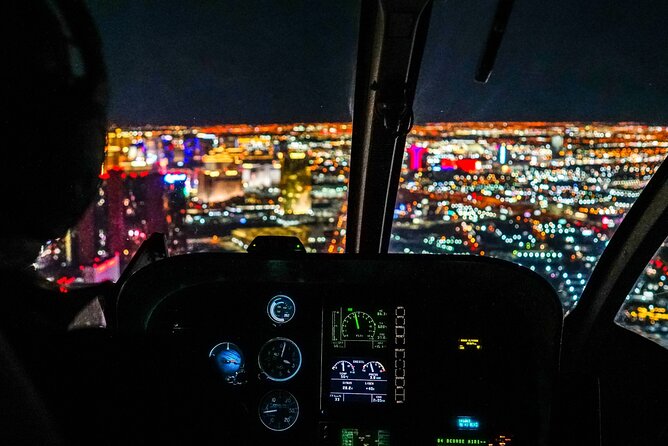 Las Vegas Strip Highlights by Helicopter at Night - Looping Around The Strat: The Big Photo Moment