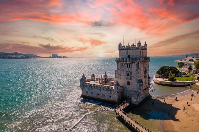 Lisbon 360 City Tour: Bike tour, Boat Trip and Helicopter Flight - Alfama’s Narrow-Charm Route: Cathedral to Praça do Comércio