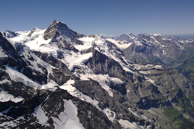 Matterhorn helicopter tour - longest scenic flight from Bern over the Swiss Alps - Valais and Sion from the air: the Rhone valley’s steep geometry
