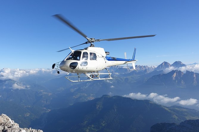 Matterhorn helicopter tour - longest scenic flight from Bern over the Swiss Alps - Matterhorn time: circling the triangular icon and seeing its corners