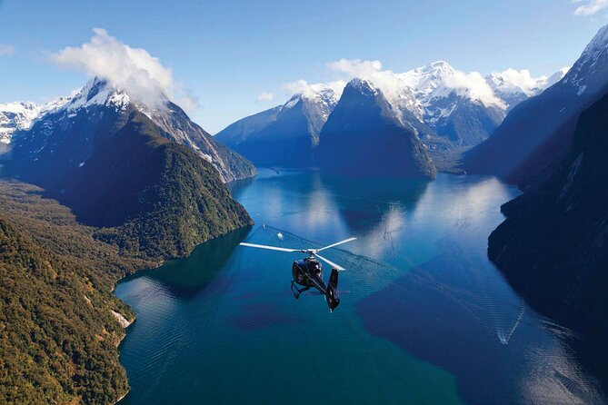 Milford and Fiordland Highlights Tour by Helicopter from Queenstown - Step out onto a remote West Coast beach: the best kind of silence