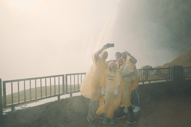 Niagara Falls Canada Tour: Helicopter, Boat, Behind Falls & Lunch - Journey Behind the Falls: The Tunnels That Make You Feel the Water