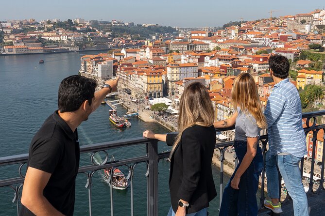 Porto 360°: Helicopter Flight, Guided Walking Tour & River Cruise - Douro River cruise by boat: scenic pace, plus one important listening trick