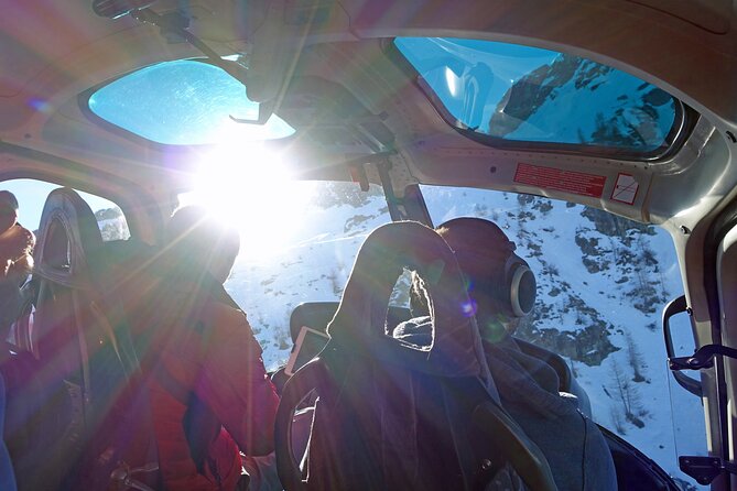 Private helicopter flight to Stockhorn mountain, with view to the Swiss Alps - Wimmis castle and Belp Berg farms during takeoff and landing
