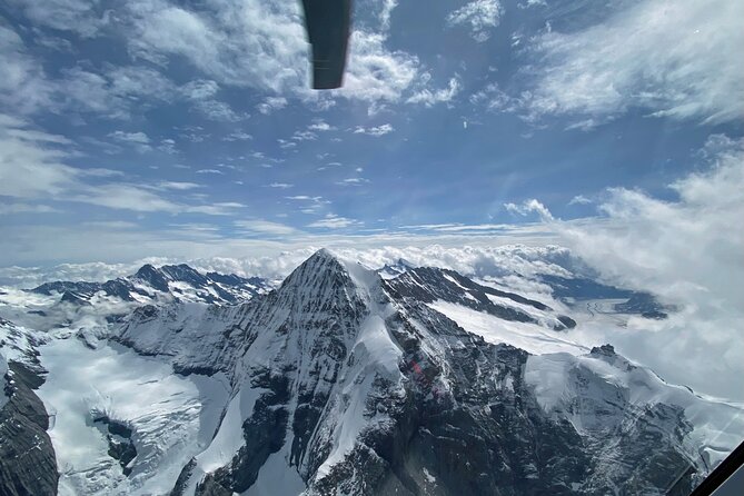 Private helicopter tour to the Swiss Alps - see the Eiger, Monch and Jungfrau - The ridge observatory building at 3,463 meters