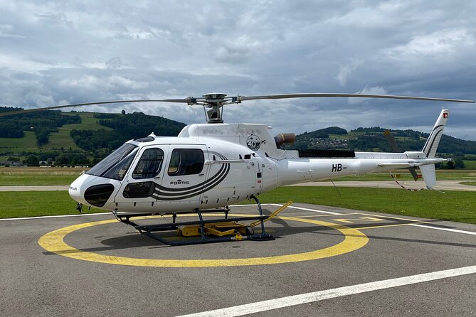 Private helicopter tour to the Swiss Alps - see the Eiger, Monch and Jungfrau - Interlaken between two lakes: a classic view from a rare angle