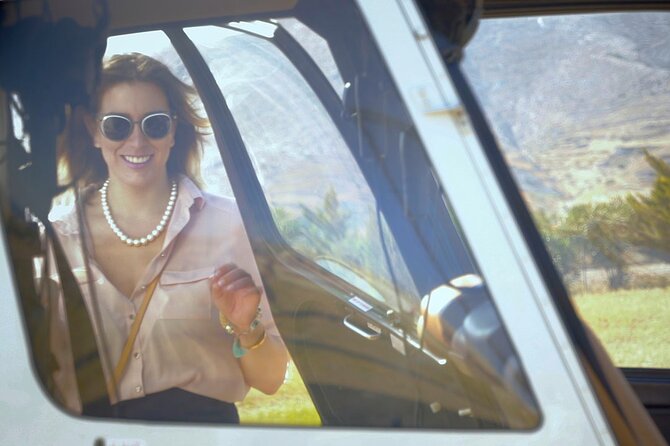 Private Helicopter Transfer from Mykonos to Santorini - Touchdown at Thermes Luxury Villas, then your van to your property