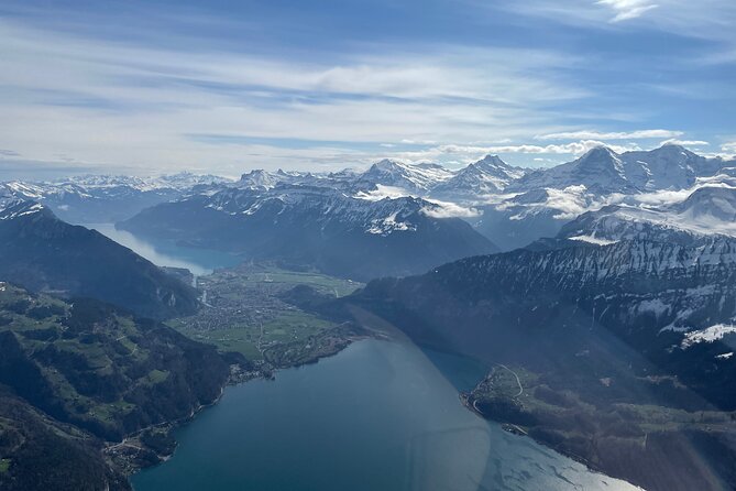 Private Swiss Alps helicopter tour over snow covered mountain peaks and glaciers - The private pilot touch: what you’ll gain from the commentary