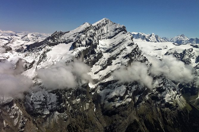Private Swiss Alps helicopter tour over snow covered mountain peaks and glaciers - Windows, photos, and the comfort factor for a short flight