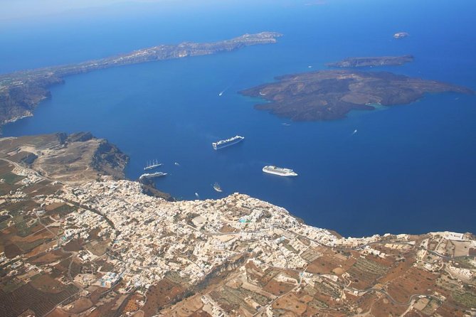 Santorini 30min Helicopter Tour - Getting to the flight: hotel pickup and the short transfer ride