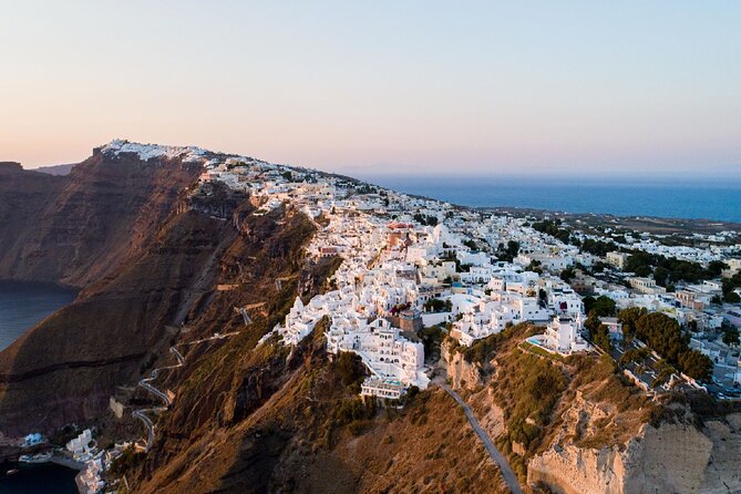 Santorini 360: Helicopter Ride, Must-See Sights & Wine Tasting - Pyrgos Kallistis: maze-like alleys and blue-domed charm