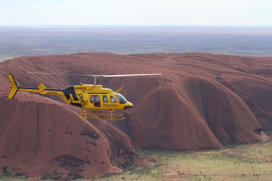 Uluru 15-Minute Helicopter Experience - Getting from Yulara to the airport in air-conditioned comfort